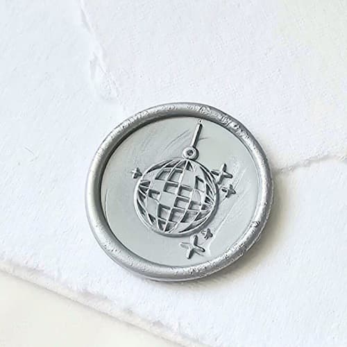 This is a multicolor wax seals by Inkspiringletters called disco ball- customizable color- set of 25 hand-crafted wax seals in standard