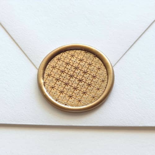 This is a multicolor wax seals by Inkspiringletters called starburst - customizable color- hand-crafted wax seals- set of 25 in standard