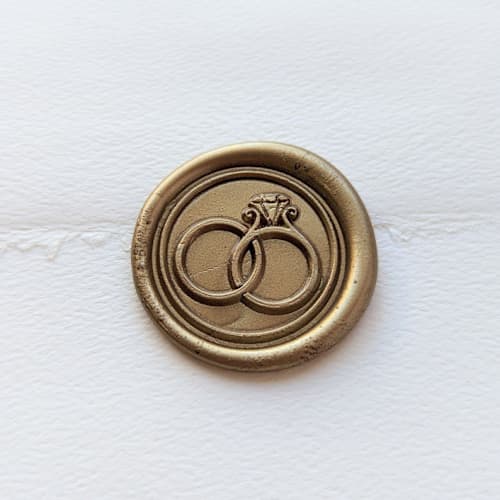 This is a multicolor wax seals by Inkspiringletters called wedding bands- customizable color- set of 25 hand-crafted wax seals in standard