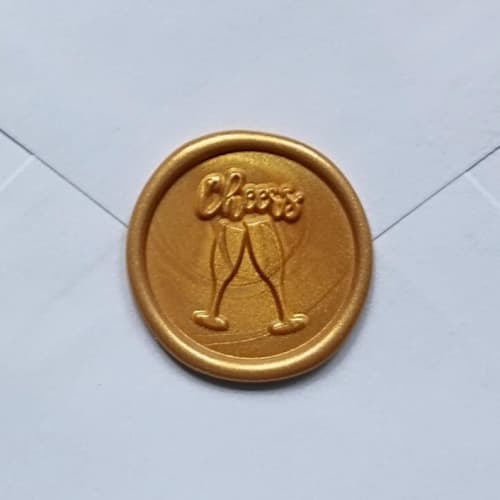 This is a gold wax seals by MC silverlinings called customizable color cheers celebration self-adhesive wax seals, set of 5 in standard