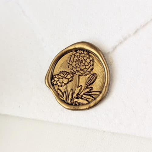 This is a multicolor wax seals by Inkspiringletters called marigold- customizable color- set of 25 hand-crafted wax seals in standard