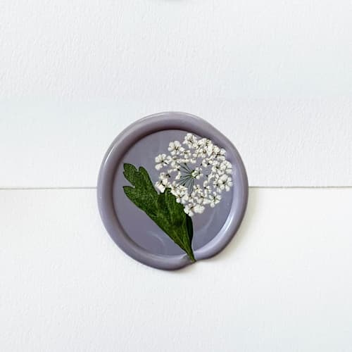 This is a purple wax seals by Caitlin Home called queen anne's lace wax seal in lilac | pack of 10 in standard