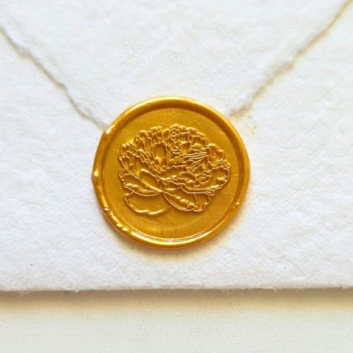 This is a multicolor wax seals by Inkspiringletters called peony bloom- customizable color- set of 25 hand-crafted wax seals in standard