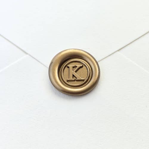 This is a multicolor wax seals by Inkspiringletters called mini monogram- customizable color- set of 25 hand-crafted wax seals in standard