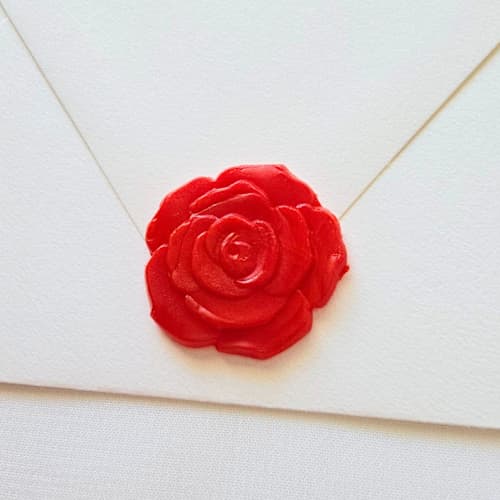 This is a multicolor wax seals by Inkspiringletters called giant roses- customizable color- set of 25 hand-crafted wax seals in standard