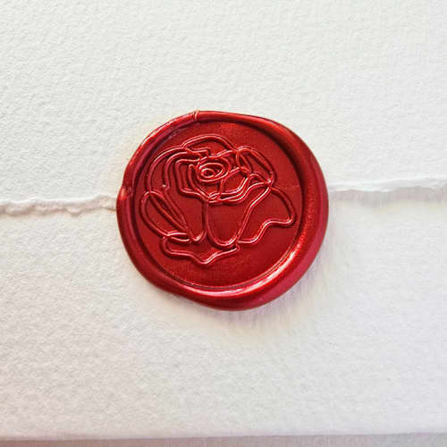 This is a multicolor wax seals by Inkspiringletters called modern rose- customizable color- set of 25 hand-crafted wax seals in standard