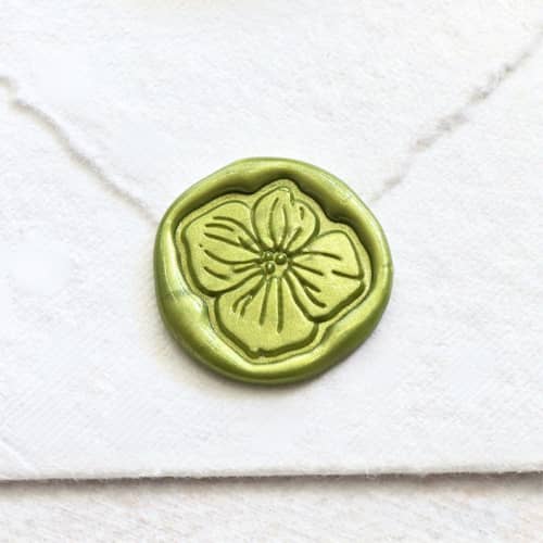 This is a multicolor wax seals by Inkspiringletters called hydrangea petal -hand-crafted wax seals - customizable color- set of 25 in standard