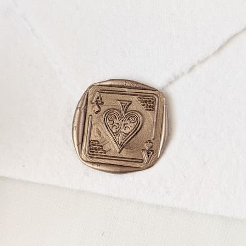 This is a multicolor wax seals by Inkspiringletters called ace- customizable color- set of 25 hand-crafted wax seals in standard