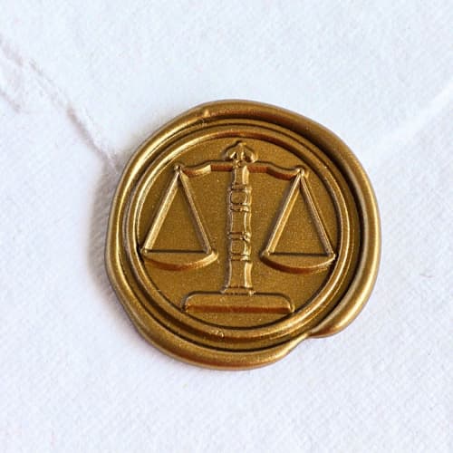 This is a multicolor wax seals by Inkspiringletters called balance- customizable color- set of 25 hand- crafted wax seals in standard