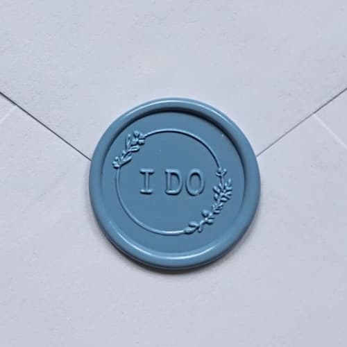This is a multicolorassorted-colors wax seals by MC silverlinings called customizable color "i do" self-adhesive wax seals, set of 5 in standard