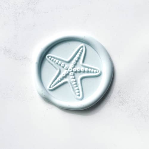 This is a blue wax seals by Abby Choi called starfish in baby blue pack of 10 in standard