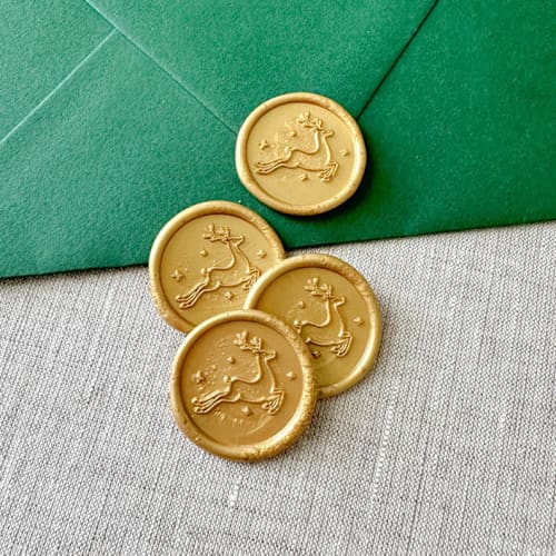 This is a multicolorassorted-colors wax seals by Orchid Studio called christmas reindeer wax seal sticker | customizable color | set of 10 in standard