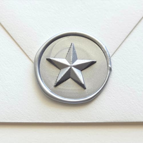 This is a multicolor wax seals by Inkspiringletters called five point star- - customizable color- hand-crafted wax seals- set of 25 in standard