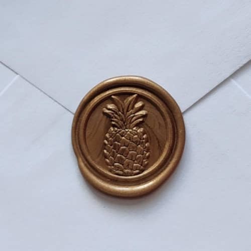 This is a multicolorassorted-colors wax seals by MC silverlinings called customizable color pineapple self-adhesive wax seals, set of 5 in standard