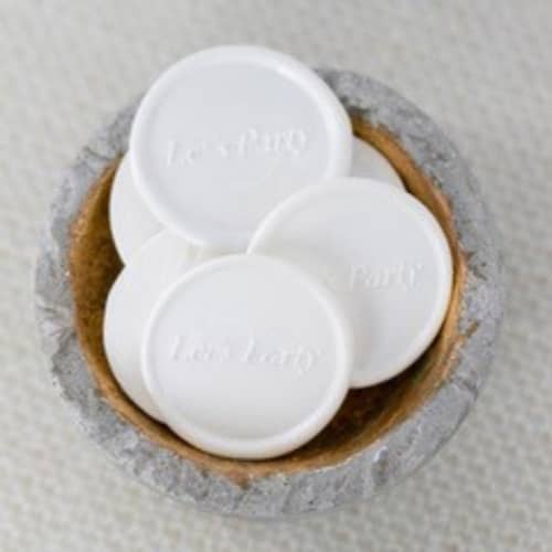 This is a white wax seals by Lindsey Cain called let's party (sold in sets of 10) in standard