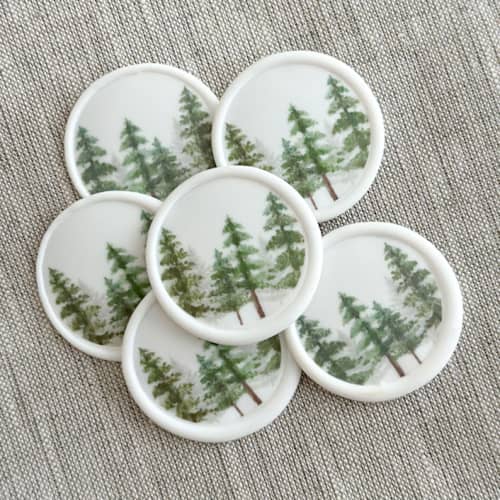 This is a white wax seals by Orchid Studio called evergreen pine forest wax seal stickers |set of 10 in standard