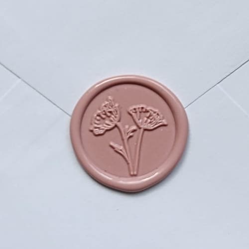 This is a multicolorassorted-colors wax seals by MC silverlinings called customizable color poppy self-adhesive wax seals, set of 5 in standard