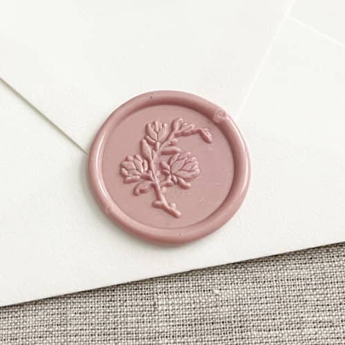 This is a pink wax seals by Orchid Studio called magnolia self-adhesive wax seal in rose pink | set of 10 in standard