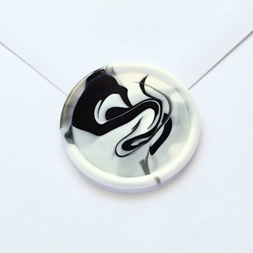 This is a multicolor wax seals by Inkspiringletters called marble - customizable colors- set of 25 hand-crafted wax seals in standard