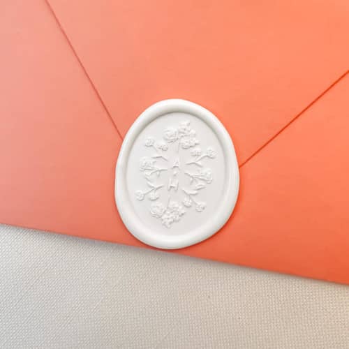 This is a white wax seals by Sterling Stripes called personalized full bloom wax seal (50 pack) in standard