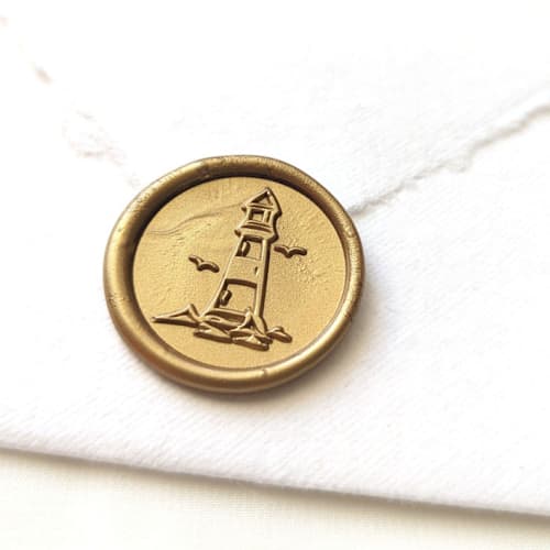 This is a multicolor wax seals by Inkspiringletters called lighthouse- customizable color- set of 25 hand-crafted wax seals in standard