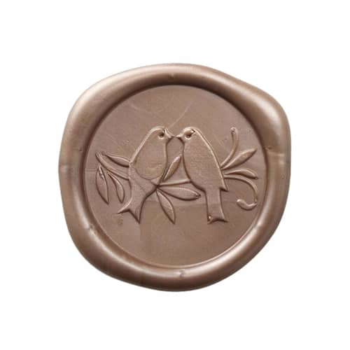 This is a gold wax seals by Papel Custom Design called love birds wax seal - antique gold - set of 25 in standard
