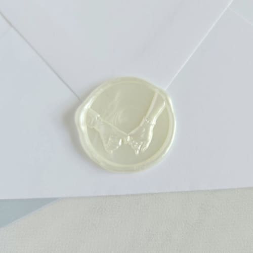 This is a multicolor wax seals by Inkspiringletters called pinky promise - customizable color- set of 25 hand-crafted wax seals in standard