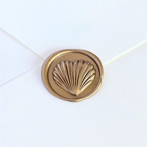 This is a multicolor wax seals by Inkspiringletters called heart seashell- customizable color- hand-crafted wax seals- set of 25 in standard