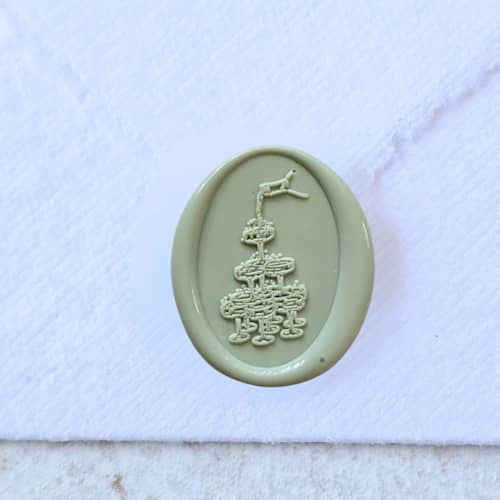 This is a multicolor wax seals by Inkspiringletters called champagne tower- customizable color- set of 25 hand-crafted wax seals in standard