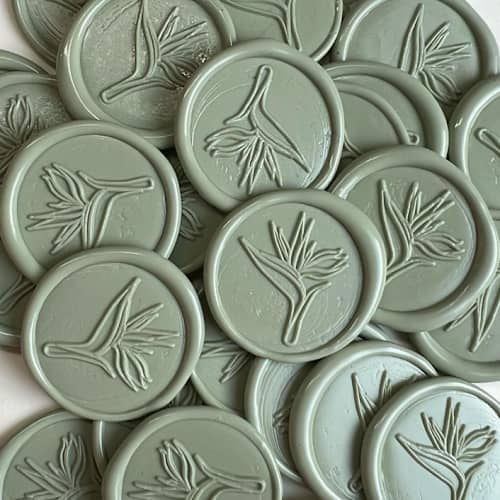 This is a multicolorassorted-colors wax seals by Eva Tadros called bird of paradise wax seal pack of 25 in standard