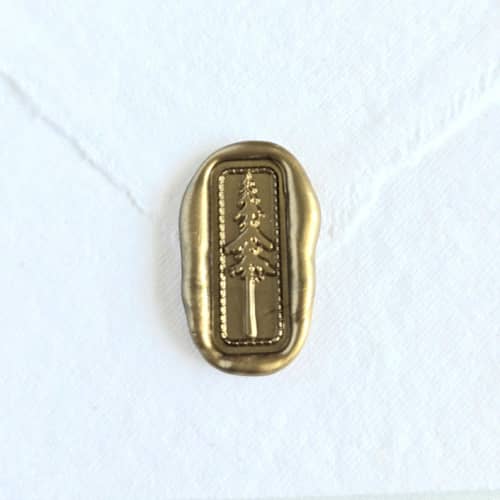 This is a multicolor wax seals by Inkspiringletters called cedar tree- customizable color- set of 25 hand-crafted wax seals in standard