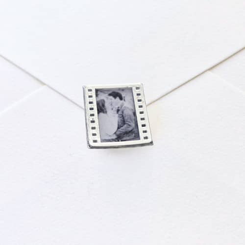 This is a clear wax seals by Inkspiringletters called fine art film strip- customizable- set of 25 hand-crafted wax seals in standard