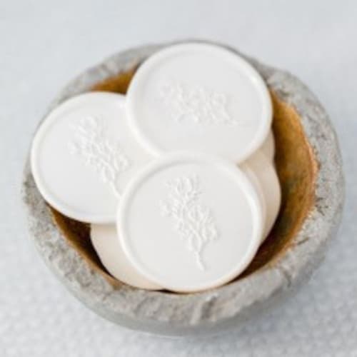 This is a white wax seals by Lindsey Cain called forever & always (sold in sets of 10) in standard