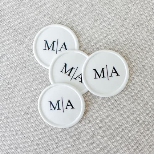 This is a white wax seals by Orchid Studio called custom initials wax seals (white base) | set of 10 in standard