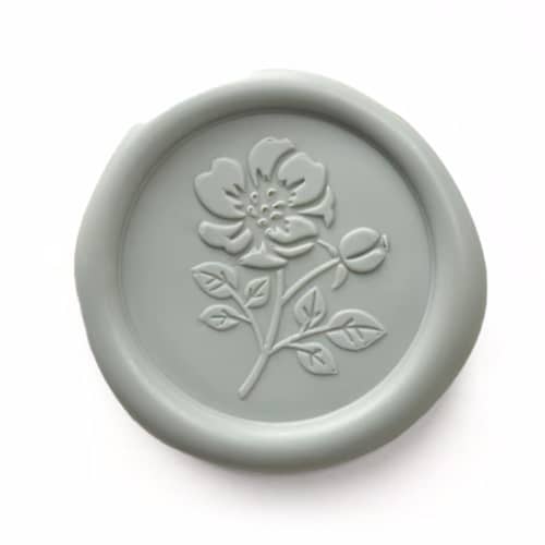 This is a multicolorassorted-colors wax seals by Papel Custom Design called floral self-adhesive wax seal set of 25 in standard