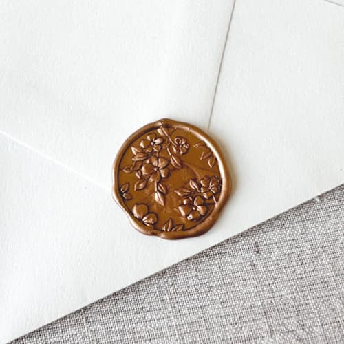 This is a gold wax seals by Orchid Studio called antique gold floral pattern 3d wax seal stickers | set of 10 in standard