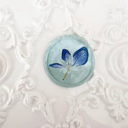 This is a blue wax seals by Caitlin Home called blue hydrangea wax seal in seafoam sage marble | pack of 10 in standard