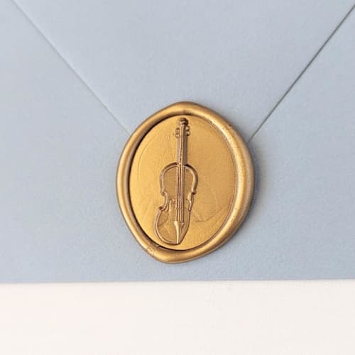 This is a multicolor wax seals by Inkspiringletters called cello- customizable color- set of 25 hand-crafted wax seals in standard