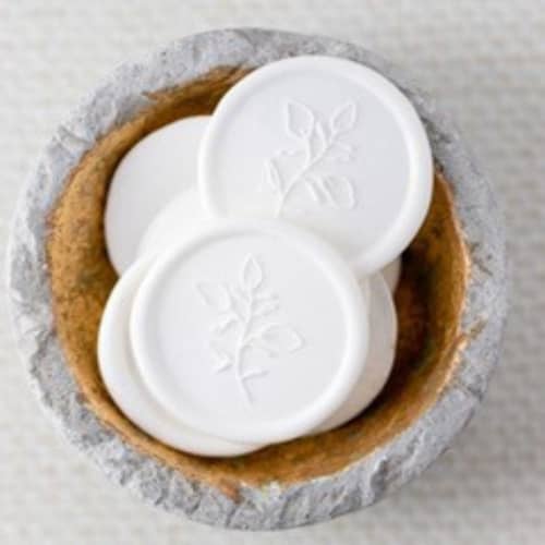 This is a white wax seals by Lindsey Cain called martha's vineyard (sold in sets of 10) in standard