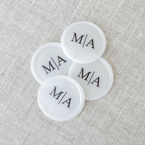 This is a clear wax seals by Orchid Studio called custom initials wax seals (translucent vellum base) | set of 10 in standard