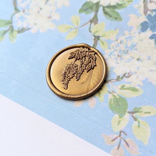 This is a multicolor wax seals by Inkspiringletters called wisteria- customizable color- set of 25 hand-crafted wax seals in standard