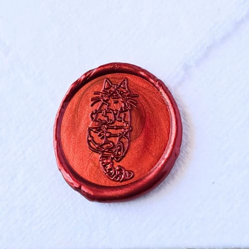 This is a multicolor wax seals by Inkspiringletters called meowy & bright- customizable color- set of 25 hand-crafted wax seals in standard