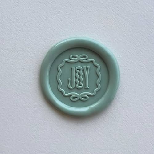 This is a multicolorassorted-colors wax seals by Eva Tadros called tied up in joy - pack of 10 in standard