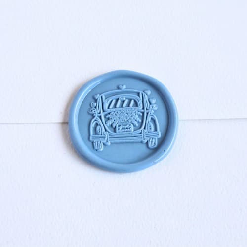 This is a multicolor wax seals by Inkspiringletters called love bug- customizable color- set of 25 hand-crafted wax seals in standard