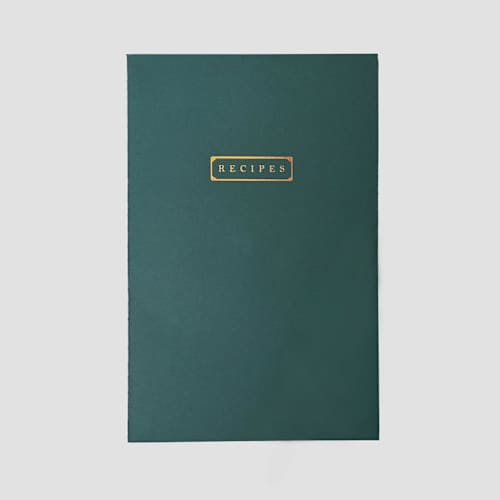 This is a green journals by Jessica Cunningham called heirloom recipes journal | softcover cooking notebook in standard