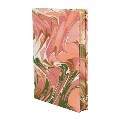 This is a pink journals by Inner Child called hand-marbled hardcover notebook in peony bloom in standard
