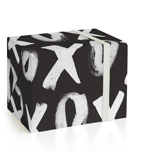 This is a black & white wrapping paper by Made by Alyx called xs & os wrapping paper in standard