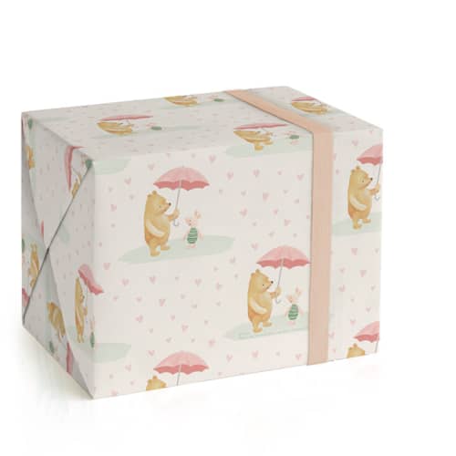 This is a blush wrapping paper by Katherine Moynagh called disney's pooh and piglet in standard