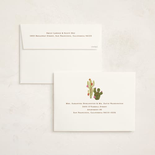 This is a candy cane holiday photo cards with standard by Sarah Knight called howdy holidays y'all printing on signature in grand