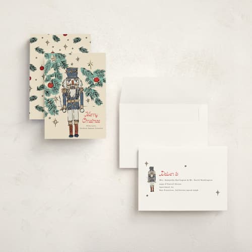 This is a blue spruce holiday photo cards with standard by Cass Loh called nutcracker wishes printing on signature in grand